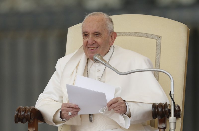 Pope Francis speaks during his general audience in St. Peter's Square at the Vatican April 3