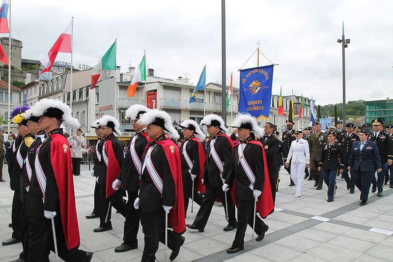 American soldiers and Knights of Columbus at a military ceremony at the WWI War Memorial in Lourdes