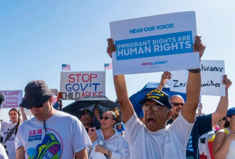 Activists shout chants during an 'End Family Detention' event at the Tornillo Port of Entry in Tornillo