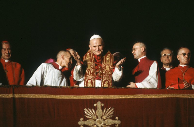 Pope John Paul II appears from St. Peter's Basilica following his election 40 years ago on the evening of Oct. 16