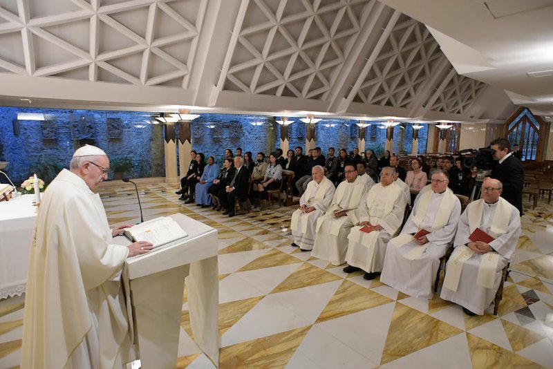 Pope Francis gives the homily as he celebrates morning Mass in the chapel of his residence