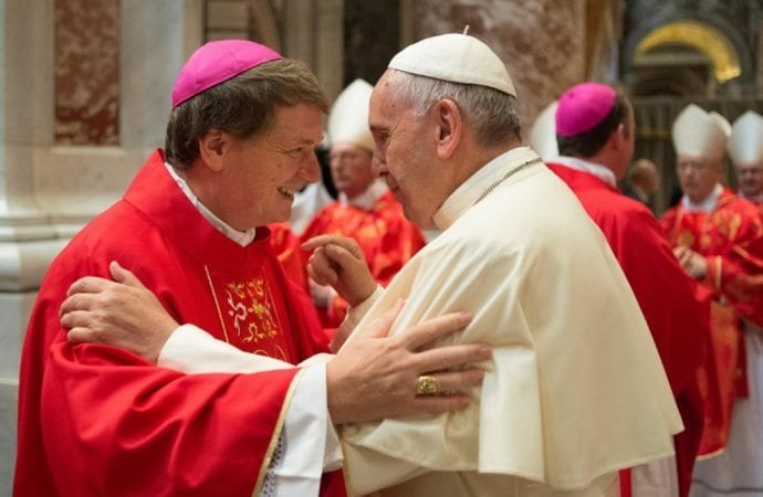 Pope Francis greets Archbishop Anthony Fisher of Sydney after a Mass marking the feast of Sts. Peter and Paul in St. Peter’s Basilica at the Vatican June 29