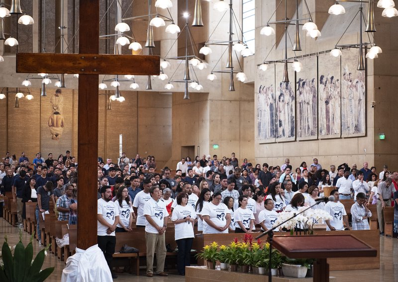 The World Youth Day Cross was welcomed by hundreds of young adult Catholics and World Youth Day pilgrims at a Mass on August 26 celebrated by Archbishop José H. Gomez at the Cathedral of Our Lady of the Angels. VICTOR ALEMÁN