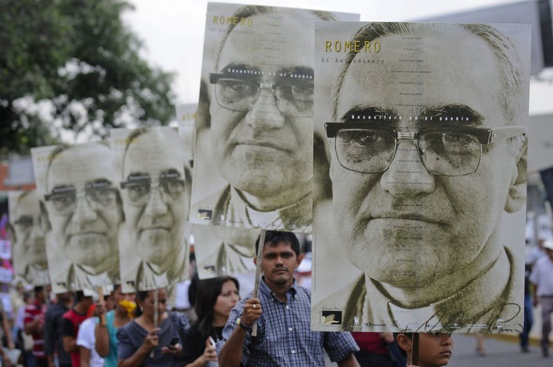 People carry large portraits of Blessed Archbishop Oscar Romero during a rally in El Salvador in 2015 to pay tribute to the late archbishop on the anniversary of his assassination. Archbishop Romero was beatified in San Salvador on May 23