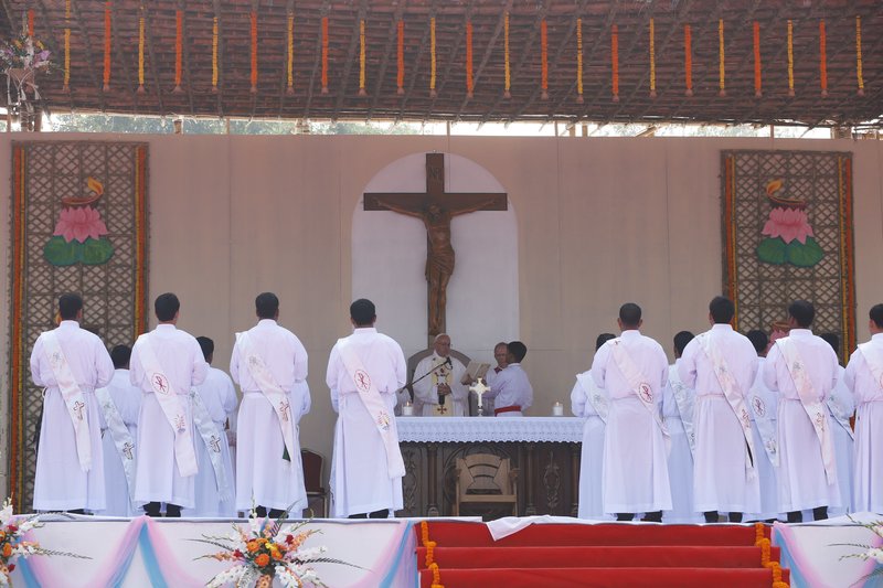 Pope Francis leads the ordination of priests during Mass in Suhrawardy Udyan park in Dhaka