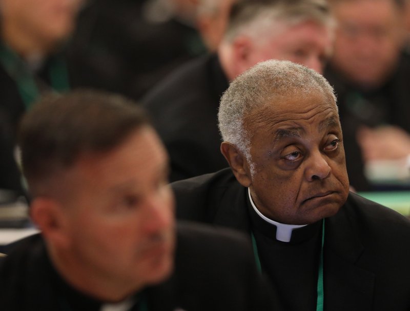 Washington Archbishop Wilton D. Gregory listens to a speaker on the first day of the spring general assembly of the U.S. Conference of Catholic Bishops in Baltimore June 11