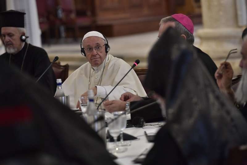 Pope Francis listens to patriarchs during an ecumenical encounter in Bari July 7