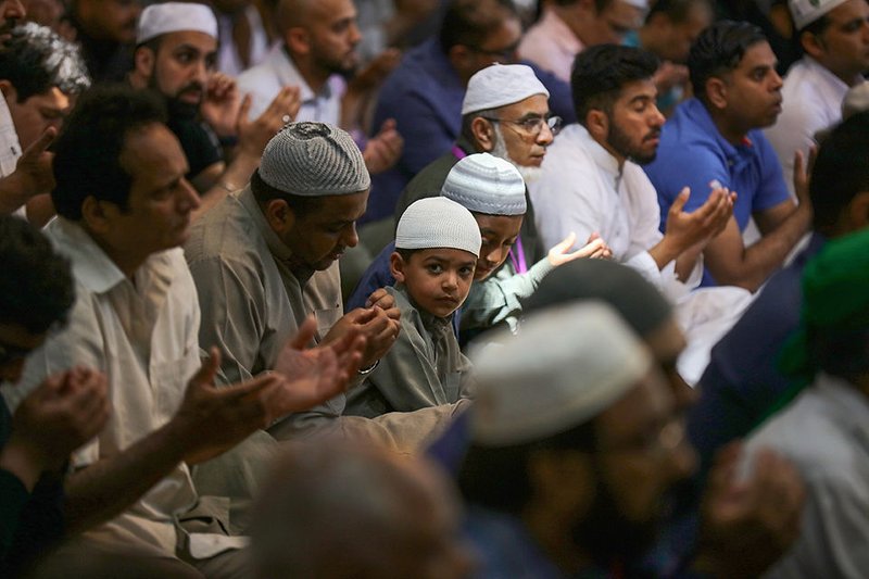 Muslims attend Friday prayers at Manchester Central Mosque May 26 in Manchester