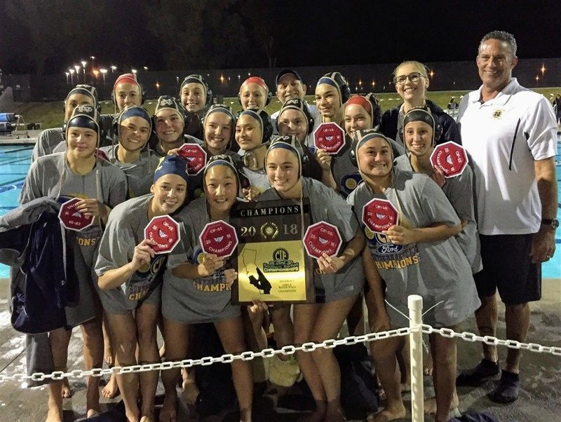 Notre Dame's girls water polo team celebrates its CIF-SS Division 5 title Feb. 24 after beating Downey 9-8 at UC Irvine.rn(Photo credit: Notre Dame High School)