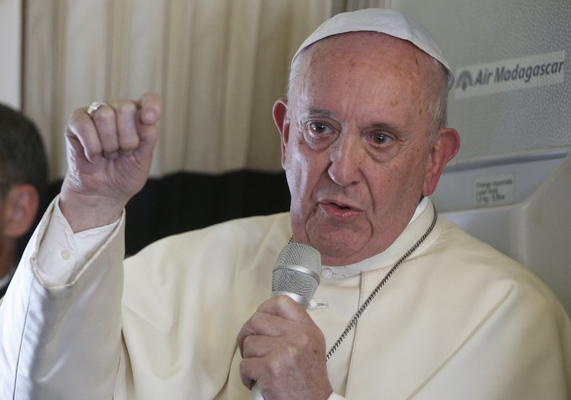 Pope Francis answers questions from journalists aboard his flight from Antananarivo