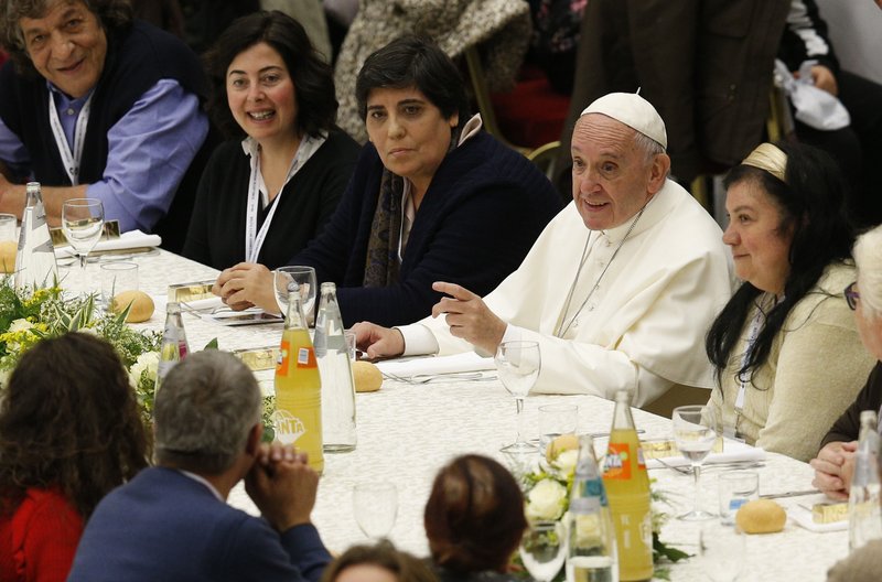 Pope Francis eats lunch with the poor in the Paul VI hall after celebrating Mass marking the first World Day of the Poor at the Vatican Nov. 19. Some 1