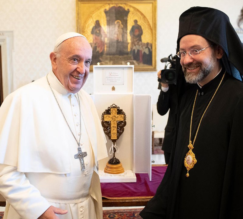 Pope Francis exchanges gifts with Orthodox Archbishop Job of Telmessos while meeting a delegation representing the Ecumenical Patriarchate of Constantinople at the Vatican June 28