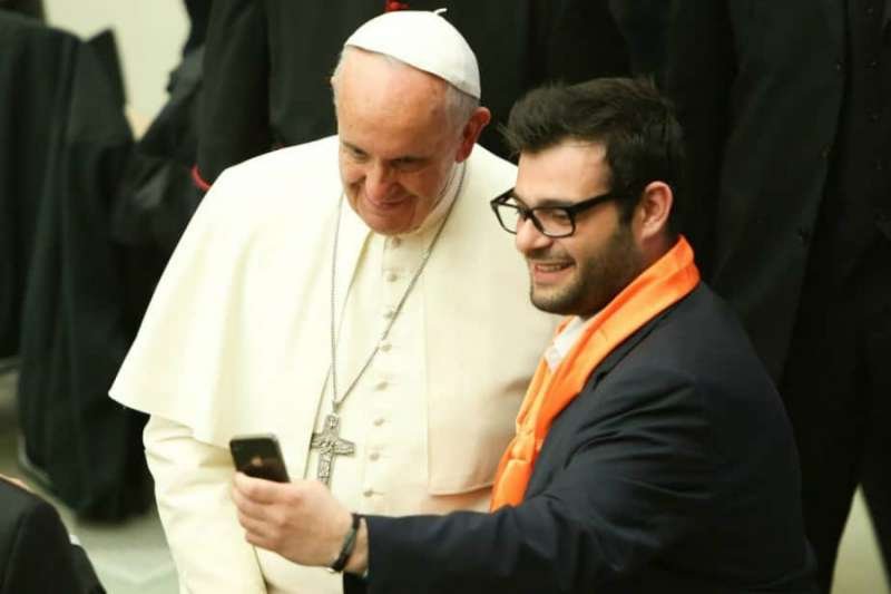 Pope Francis joins a selfie in Paul VI Hall on April 30
