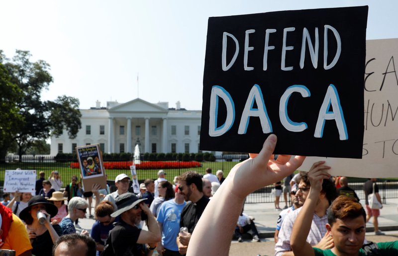 Deferred Action for Childhood Arrivals supporters demonstrate near the White House in Washington Sept. 5. Attorney General Jeff Sessions announced Sept. 5 that the DACA program is "being rescinded" by President Donald Trump