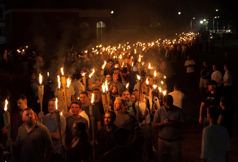 White nationalists carry torches on the grounds of the University of Virginia in Charlottesville