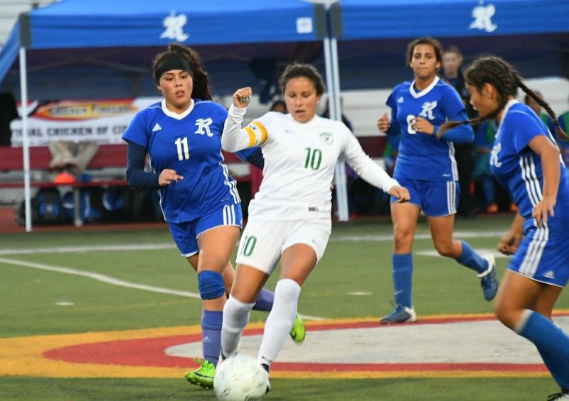San Gabriel Mission midfielder Alyssa Lopez (10) maneuvers through Rialto defenders during the Pioneers’ CIF-SS title game victory March 2. San Gabriel Mission plays Orosi in the second round of the state regional tournament March 8. (Photo: San Gabriel Mission High School)