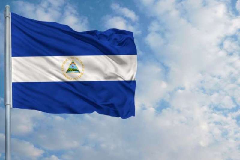 The flag of Nicaragua. Credit: Millenius/Shutterstock.
