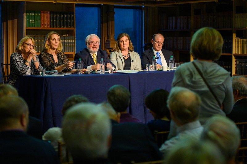 A guest asks a question during a June 14