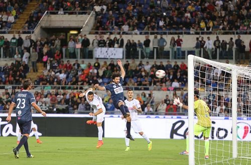 Soccer players participate in the 2014 Match for Peace in Rome's Olympic Stadium