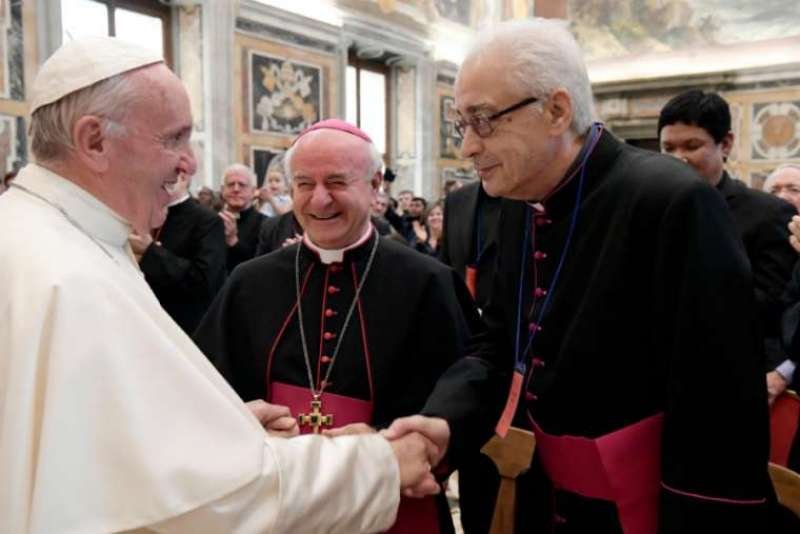 Pope Francis greets officials of the John Paul II Institute at the Clementine Hall in the Vatican