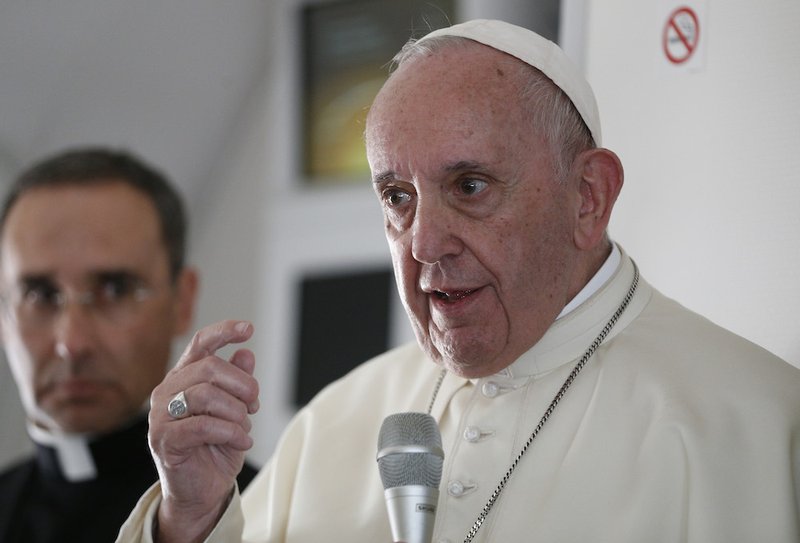 Pope Francis answers questions from journalists aboard his flight from Abu Dhabi