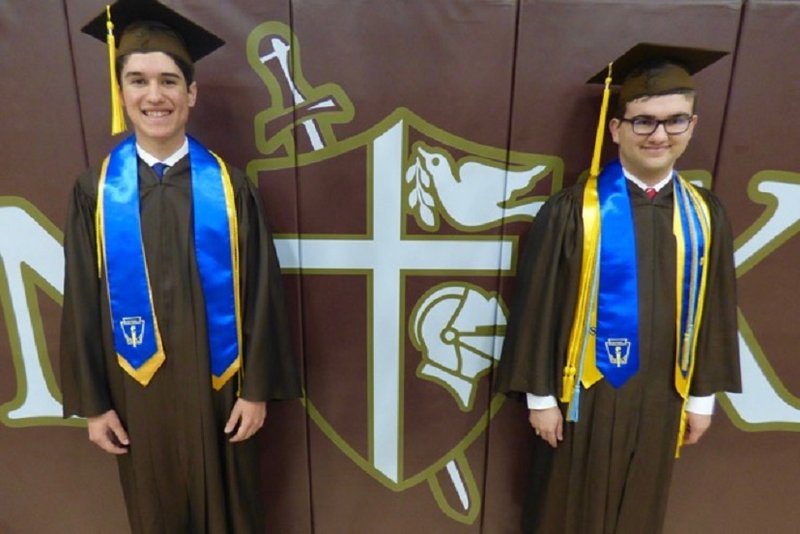 Two St. Francis graduates. Photo courtesy St. Francis High School.