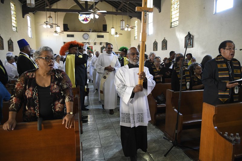 Faithful attend the 8th Annual African American Catholic Ancestral Mass at St. Odilia Church in South Los Angeles November 10