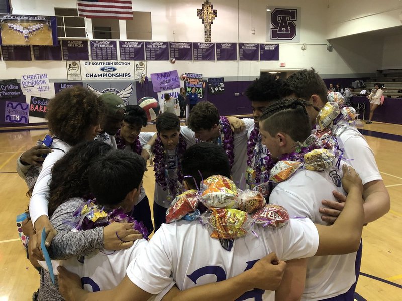 St. Anthony's volleyball team huddles during their final game of the season. (PHOTO COURTESY ST ANTHONY SAINTS TWITTER)