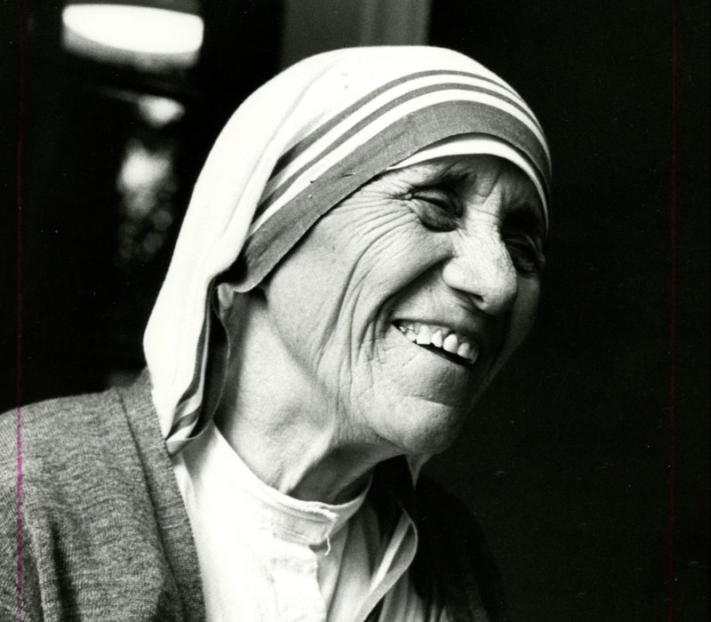 St. Teresa of Kolkata smiles during the opening of a Missionaries of Charity convent in Detroit in 1979. (CNS photo/Dwight Cendrowski)