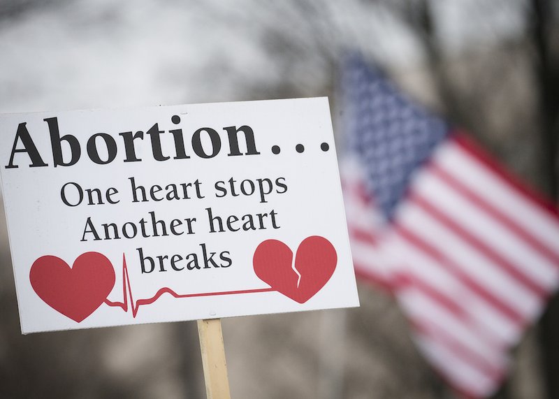 A pro-life sign is displayed during the 2019 annual March for Life rally in Washington Jan. 18. By passing a bill to ban abortion in nearly all circumstances