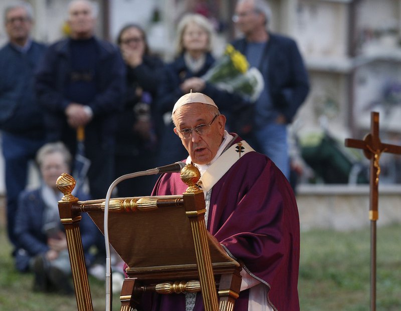 Pope Francis celebrates Mass on the feast of All Souls Nov. 2 at Laurentino Cemetery in Rome. (CNS photo/Paul Haring)