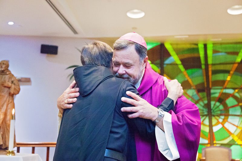 Bishop Salazar congratulates Brother Stephen