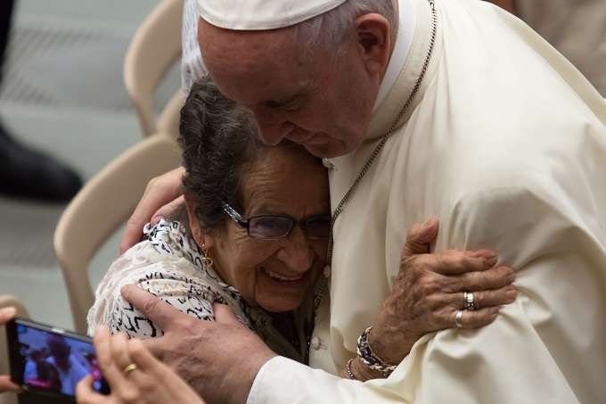 Pope Francis greets pilgrims during his Aug. 2