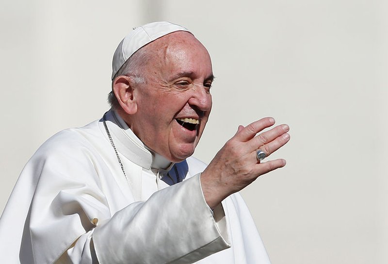Pope Francis greets the crowd during his general audience in St. Peter’s Square at the Vatican March 1. (CNS PHOTO/PAUL HARING)