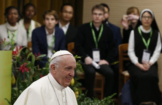 Pope Francis attends a pre-synod gathering of youth delegates in Rome March 19. The Synod of Bishops on young people
