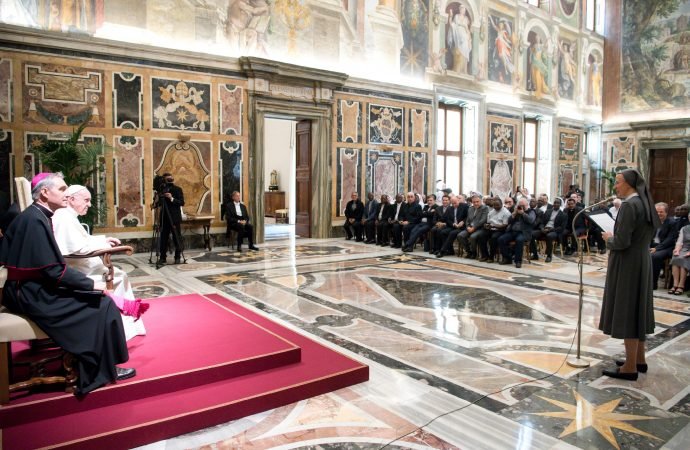 Pope Francis listens to Consolata Sister Simona Brambilla