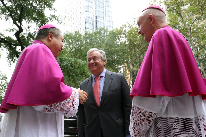 U.N. Secretary-General Antonio Guterres is greeted by Archbishop Bernardito Auza