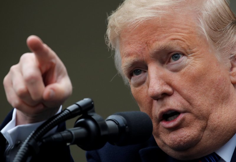 President Donald Trump speaks to reporters at the White House in Washington Jan. 4 following a meeting with congressional leadership about the ongoing partial government shutdown. (CNS PHOTO/JIM YOUNG