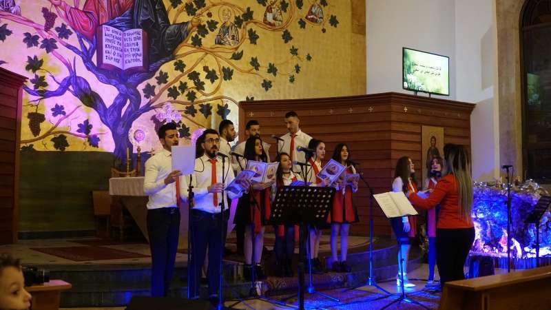 Young Chaldean Catholics refugees from Iraq perform a Christmas choral concert in Beirut