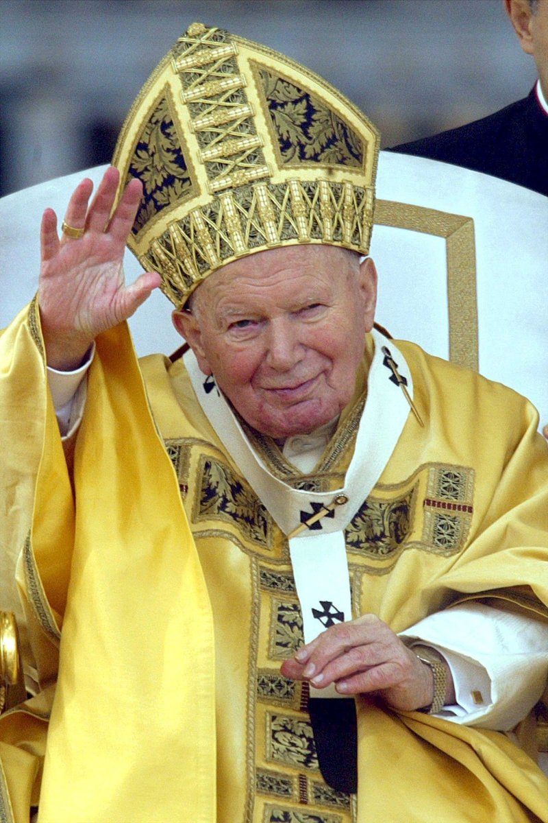 Pope John Paul II greets the crowd gathered in St. Peter's Square at the Vatican in 2002. (CATHOLIC NEWS SERVICE/ALESSANDRO BIANCHI