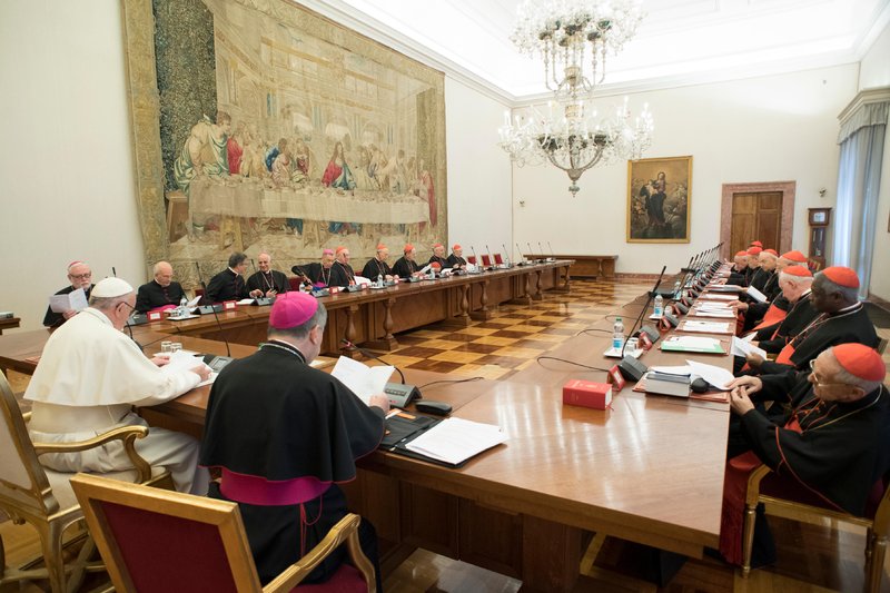 Pope Francis meets with the heads of Vatican offices in 2017. The interdicasterial meetings are held periodically to coordinate the work of the Roman Curia. (CATHOLIC NEWS SERVICE/L'OSSERVATORE )ROMANO