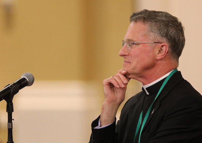 Archbishop Timothy P. Broglio of the U.S. Archdiocese for the Military Services speaks from the floor during the spring general assembly of the U.S. Conference of Catholic Bishops in Baltimore June 11