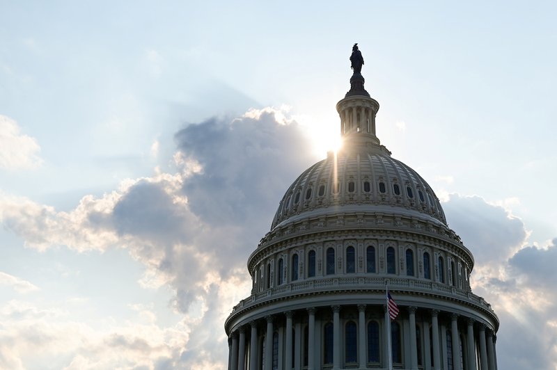 The dome of the U.S. Capitol is seen as the sun sets on Capitol Hill in Washington July 26