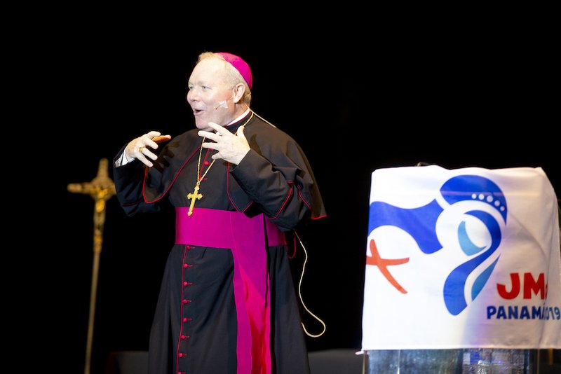 Bishop Edward J. Burns of Dallas speaks to World Youth Day pilgrims in Panama City Jan. 23