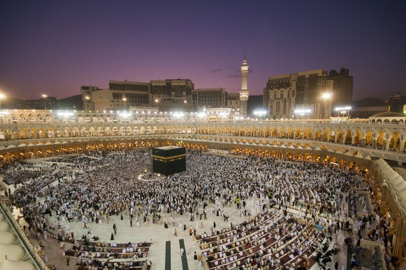 Muslim pilgrims circumambulate the Kaaba after dawn prayer at Masjidil Haram in Makkah