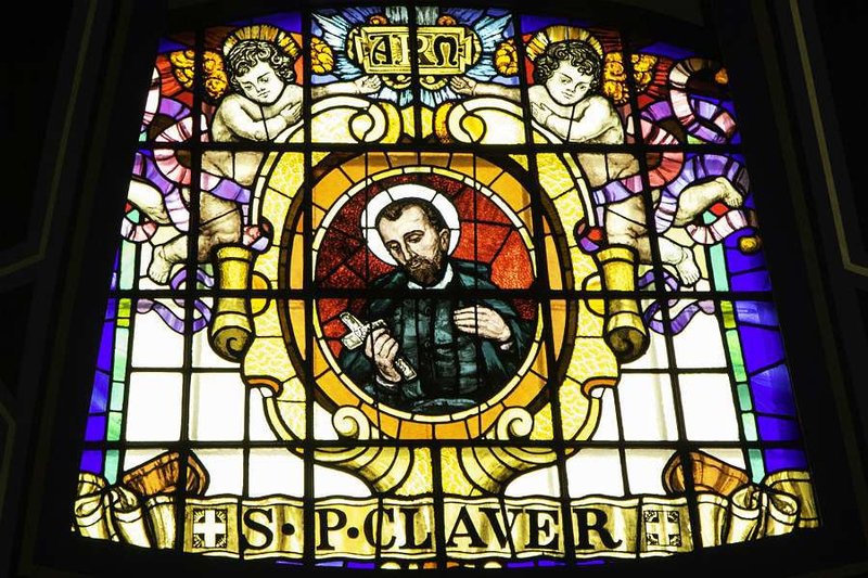 A stained glass image of St. Peter Claver in St. Aloysius Church Glasgow (Credit : Lawrence OP via Flickr/CC 2.0)