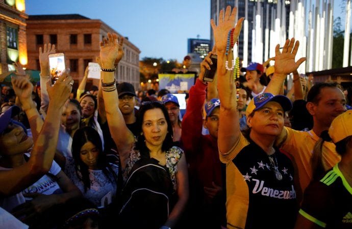 Venezuelan residents protest against Venezuelan President Nicolas Maduro's government in Medellin