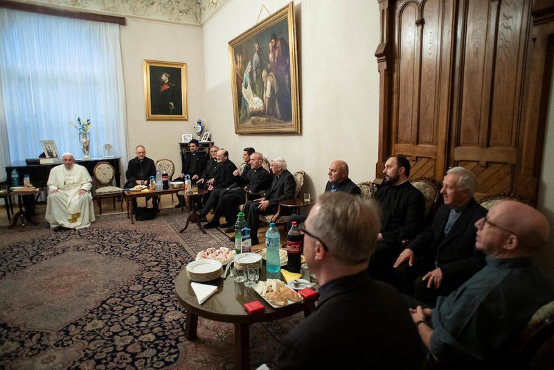 Pope Francis meets with a group of Jesuits at the apostolic nunciature in Bucharest