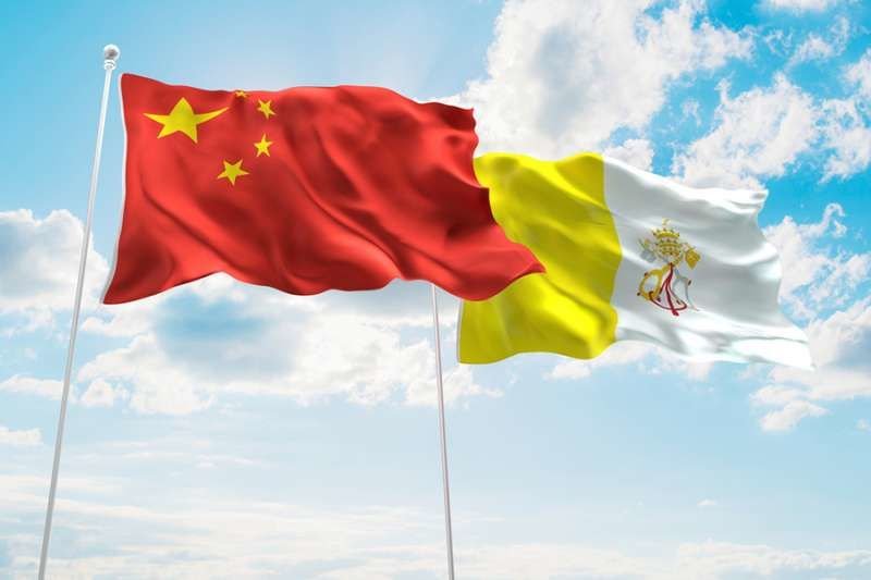 Chinese and Vatican flags. Credit: FreshStock/Shutterstock
