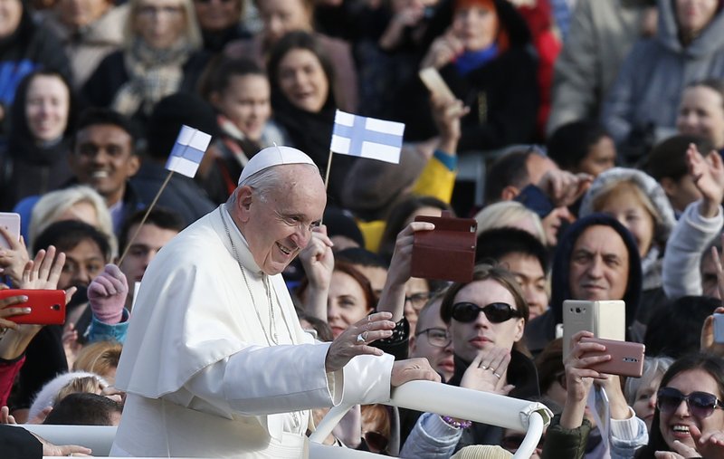 Pope Francis greets the crowd before celebrating Mass in Freedom Square in Tallinn